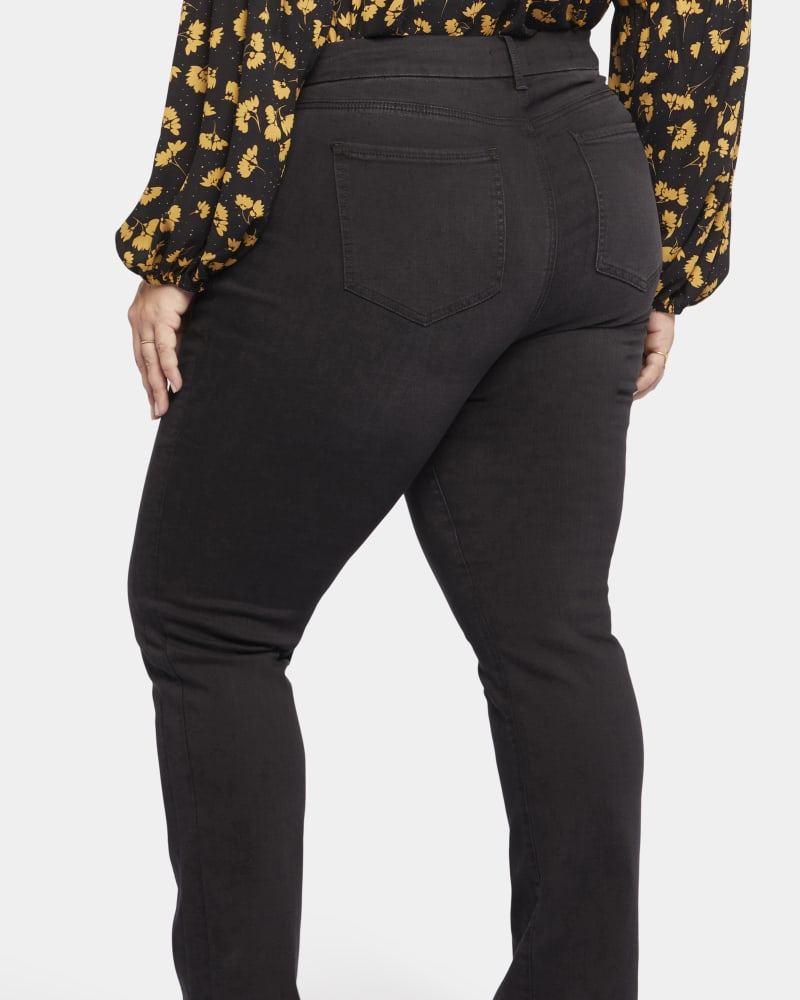 Back of a model wearing a size 14W Slimmer Marilyn Straight Jean in Legend by NYDJ. | dia_product_style_image_id:228408